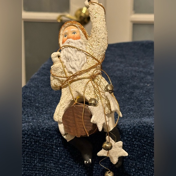Other - Wild western Santa hangs from gold thread with stars and bells.